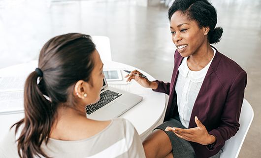 Legal representative meeting with a client