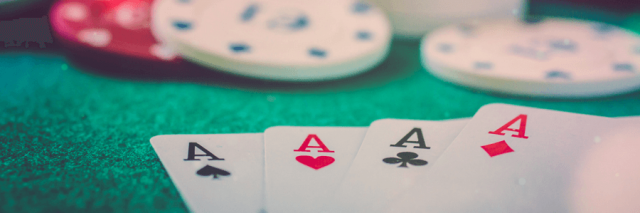 Poker cards and chips on casino table