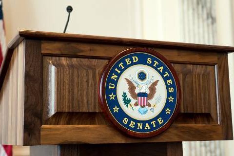 U.S. Senate podium with logo and flag
