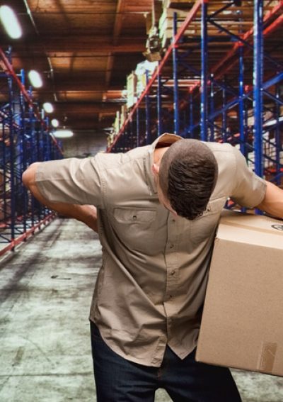 Delivery man having backache due to lifting boxes