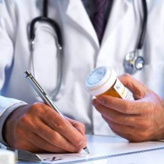 Doctor prescribing medication