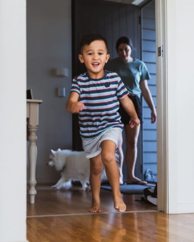 child running around the house