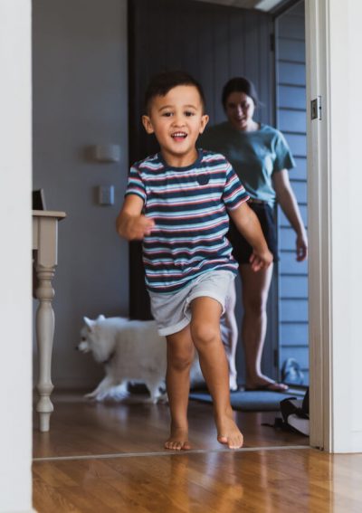 child running around the house