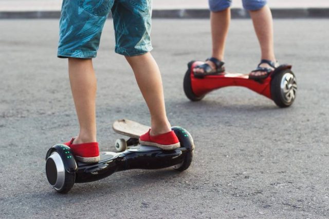 Children playing on hoverboards