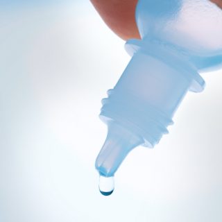 Eye drops in clear bottle