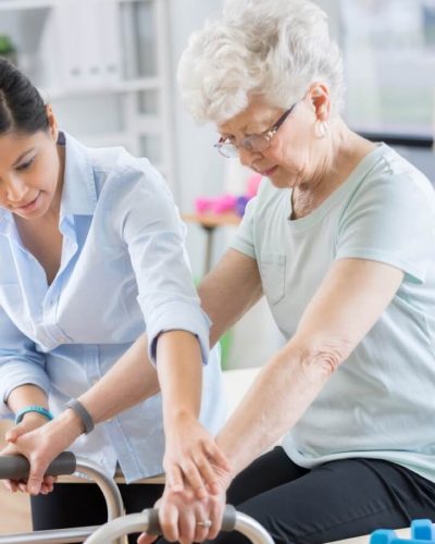 elderly woman in hip physical therapy