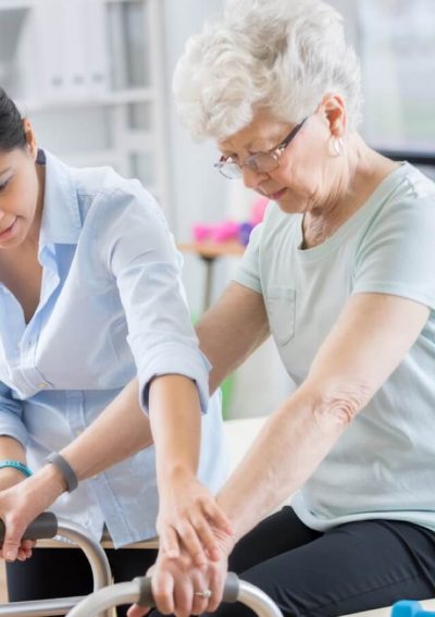 elderly woman in hip physical therapy