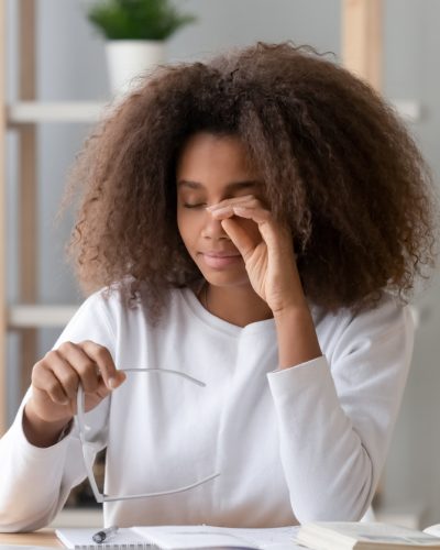 Girl rubbing her eyes