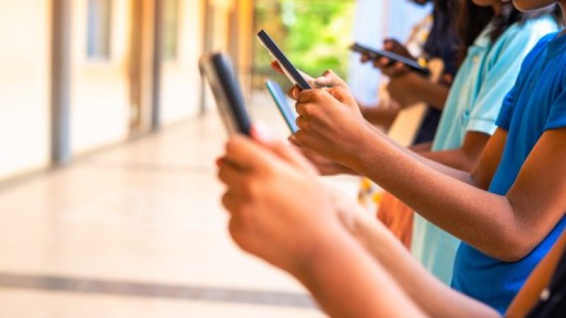 Kids using smartphones