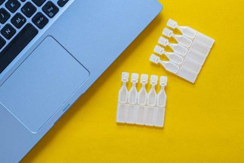 Laptop with dry eye drops packaging