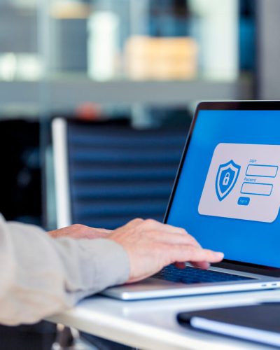 Businessman logging on to a password protected website