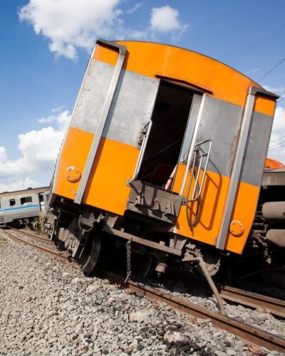 Train derailed off of train tracks.