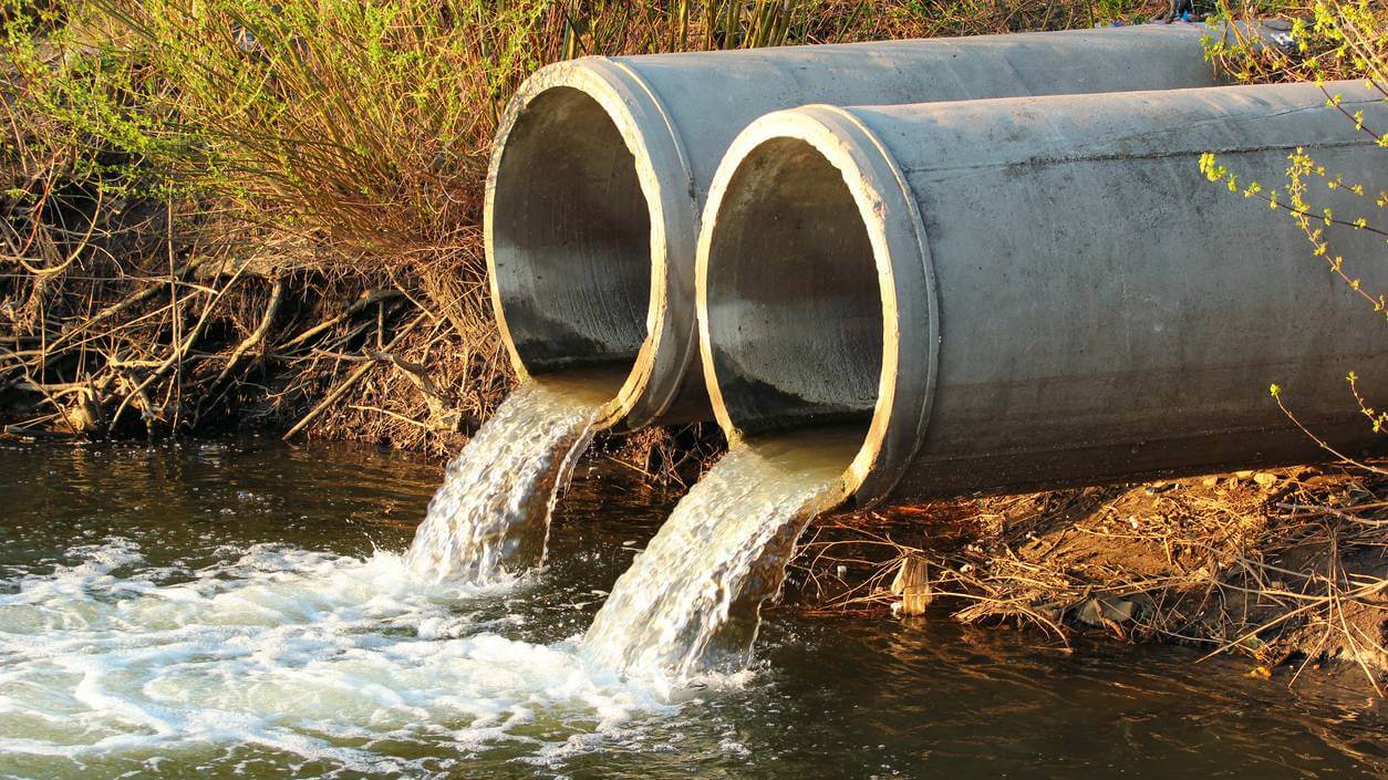 Discharge of sewage into a river